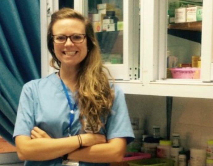 Brittany Jonap stands in a pharmacy.