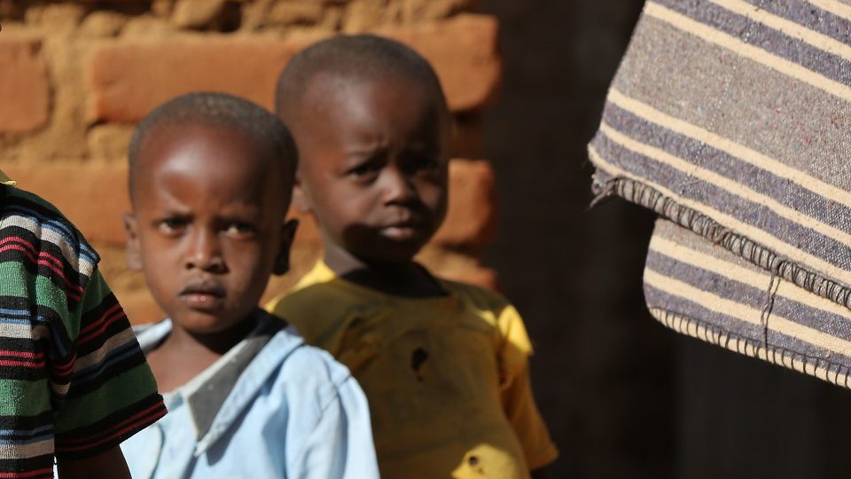 Matheka (L) Give access to education to a child.