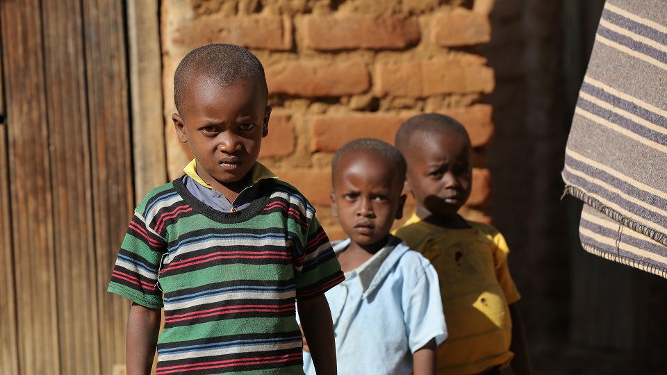 Matheka and his brothers. Send a child to school.