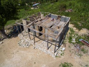 the remains of a home destroyed by hurricane