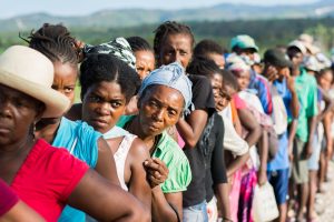 close up of faces of people who lost everything in the storm in haiit