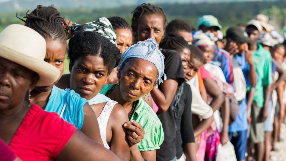 close up of faces of people who lost everything in the storm in haiit