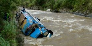 truck turned over in overflowing river