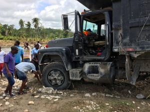 large truck stuck in the mud