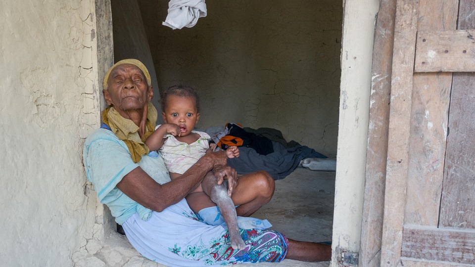 Darline's grandmother can't open her eyes because of muscular issues.