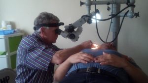 Doctor examining a patient eye exam