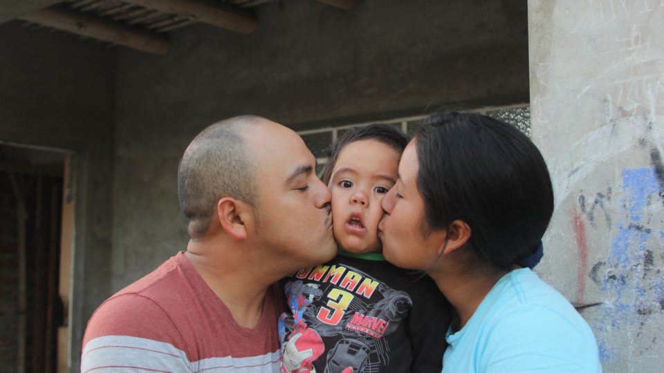 Becker being kissed by mom and dad angel peru