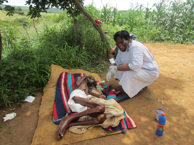 heki in Swaziland with palliative care team member