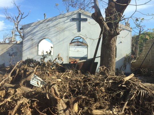 Sun shines through church destroyed by Hurricane Matthew