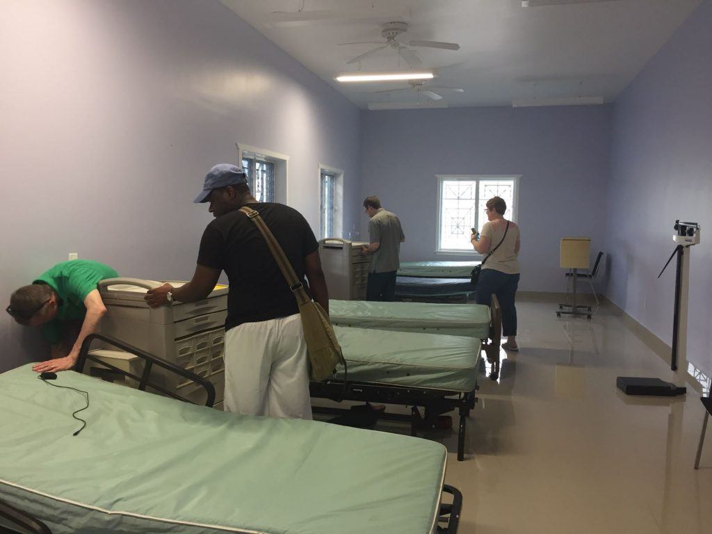 Inspecting hospital beds at the new health center in Haiti. 