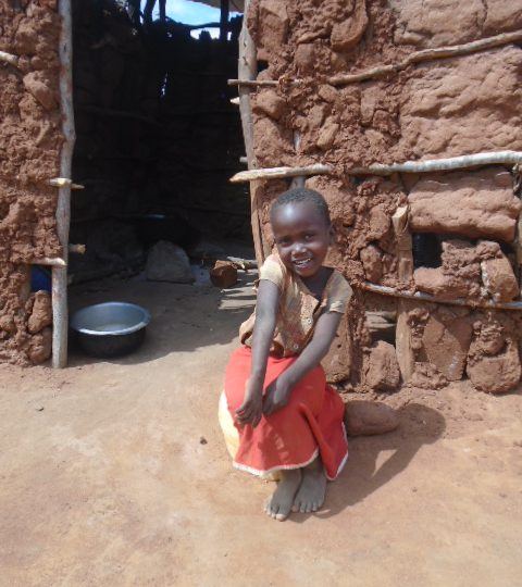 Racheal outside her home