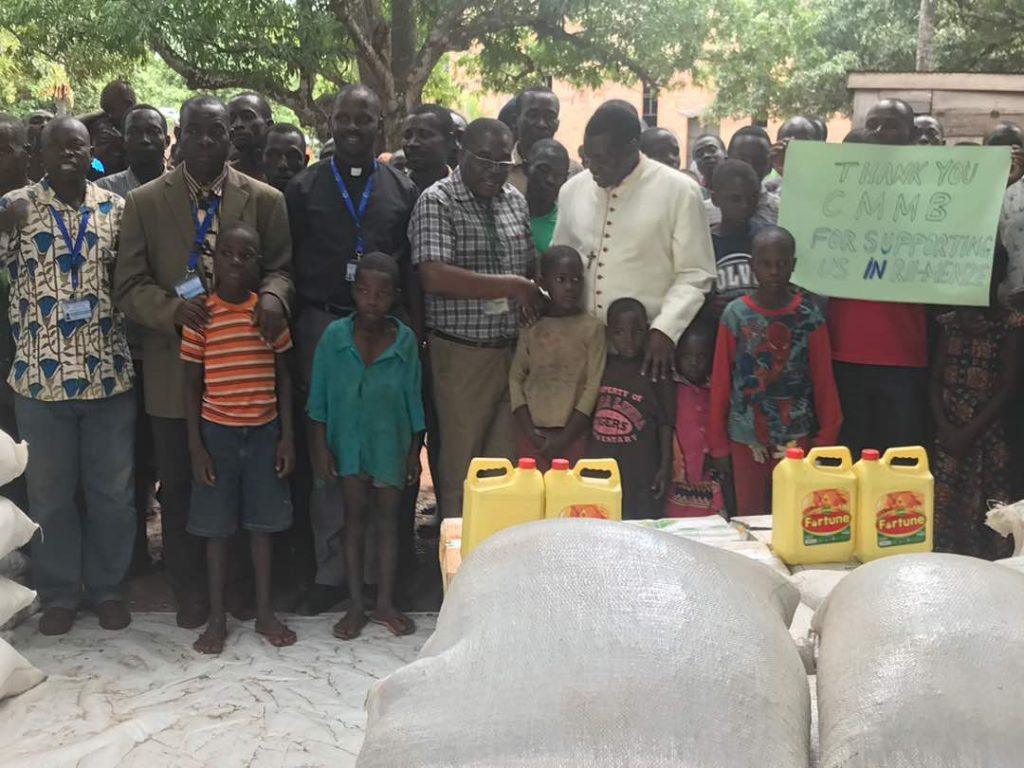 Thankful people. South Sudanese people living in Rimenze are thankful for the food. CMMB