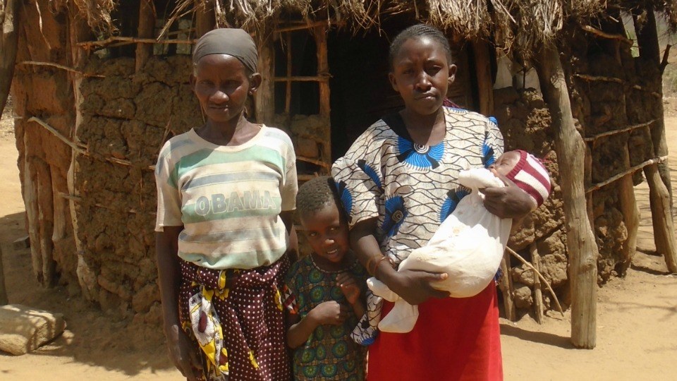 Kalumu with her family