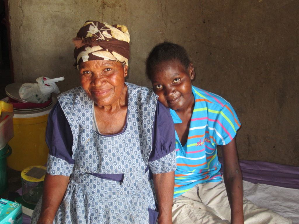 Gogo and Bonsile in Swazliand. The Hartmann's provide care along with the home-based care team.