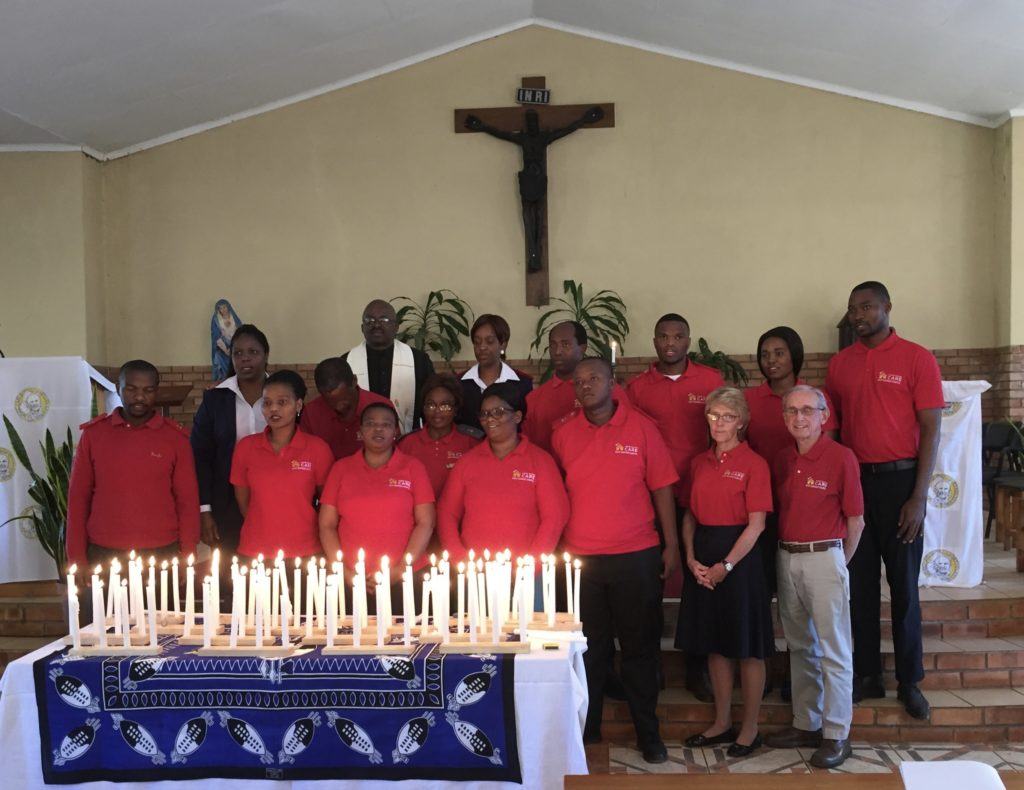 Women and men who make up the home based care team in eSwatini with the Hartmann