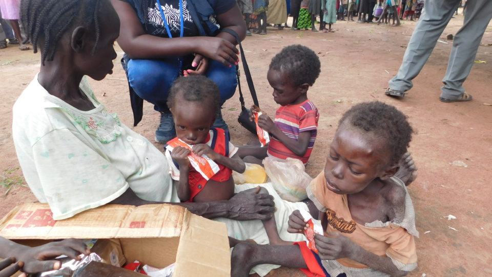 family in South Sudan receiving much needed food