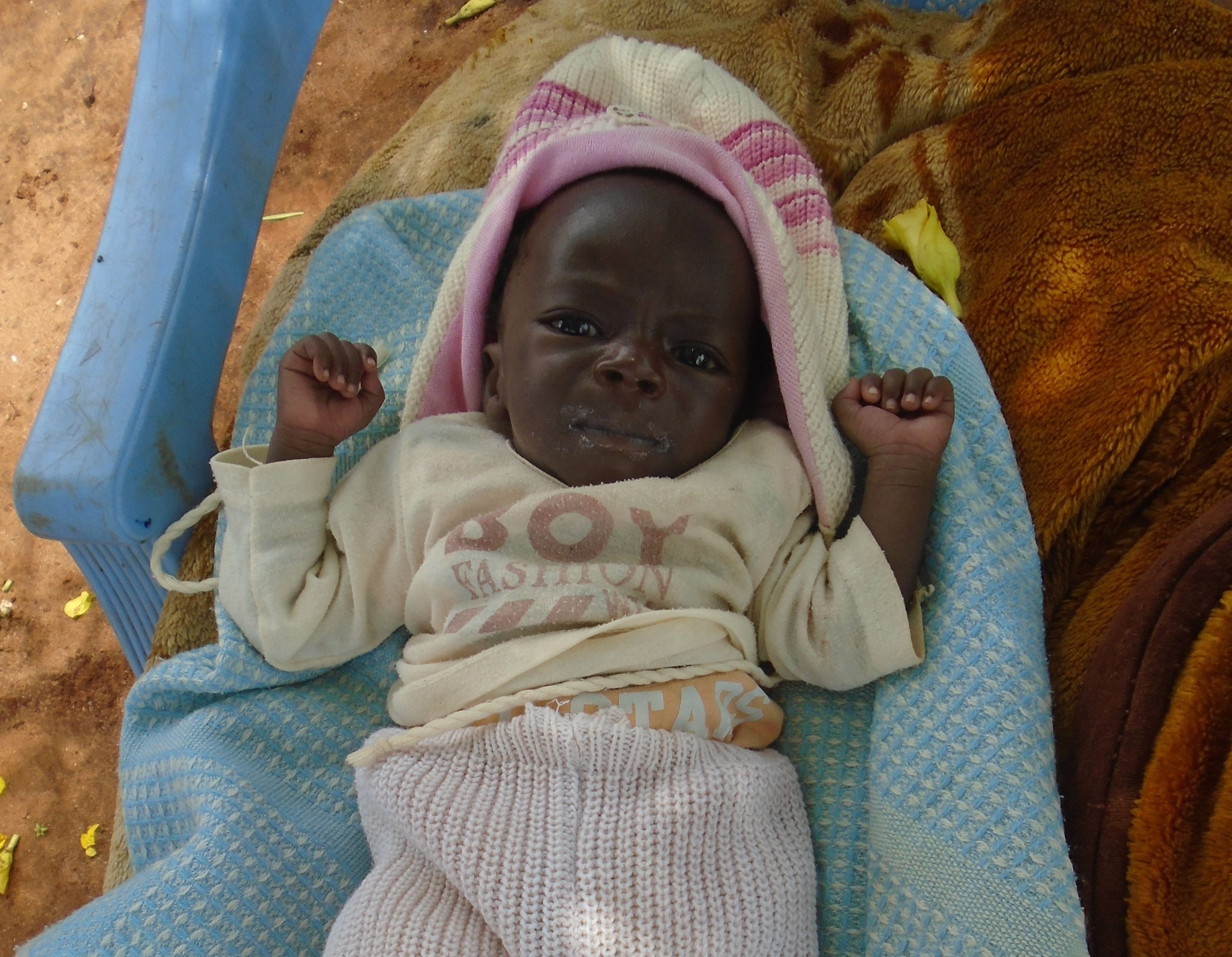 Gedion, at one month old, was severely underweight and struggling to survive