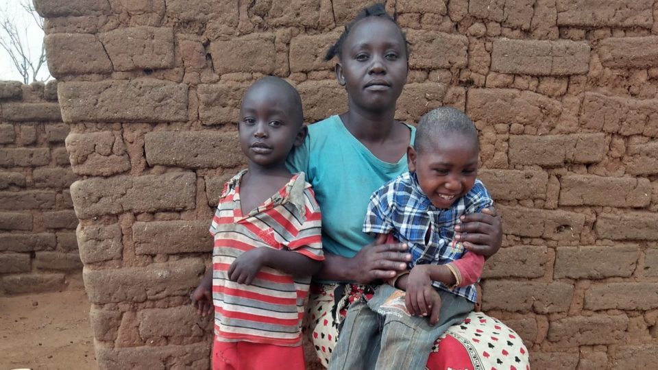 Amos with his mother and brother.