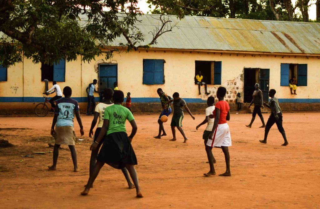 Girls playing football in South Sudan