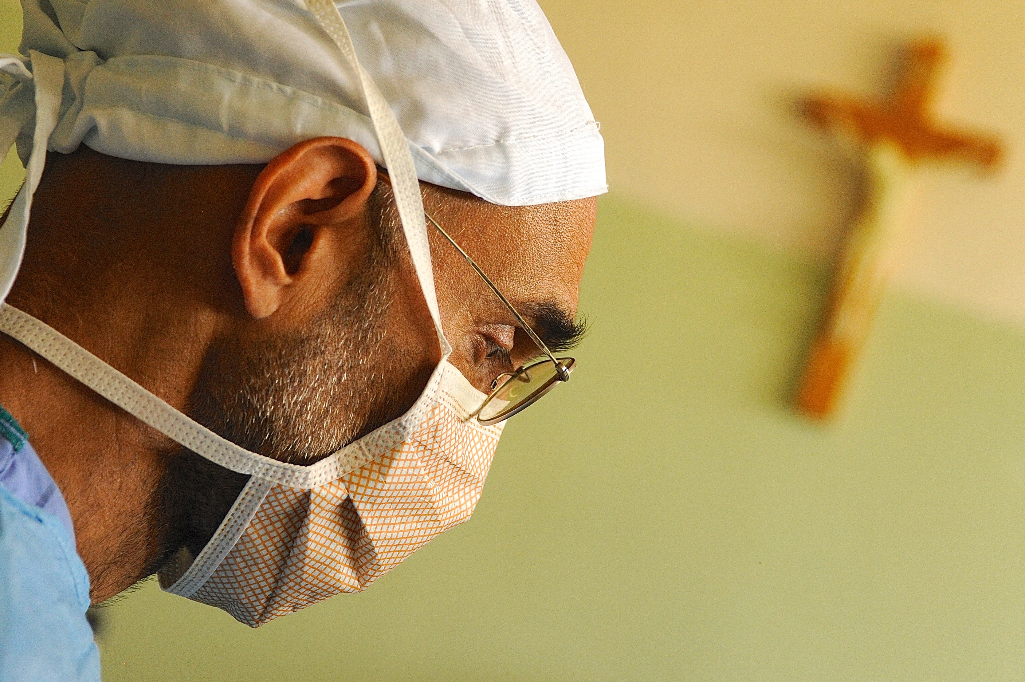 Dr. Tom Catena, the Heart of the Nuba Mountains, in surgical scrubs