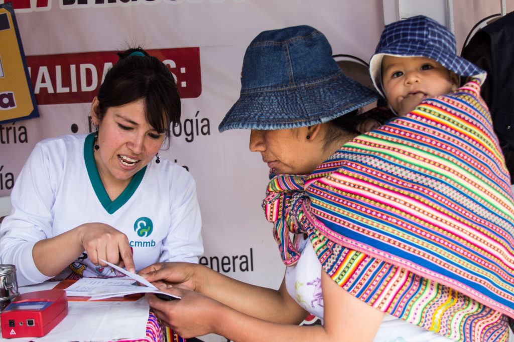 Mother, baby and nurse in Huancayo (Peru)