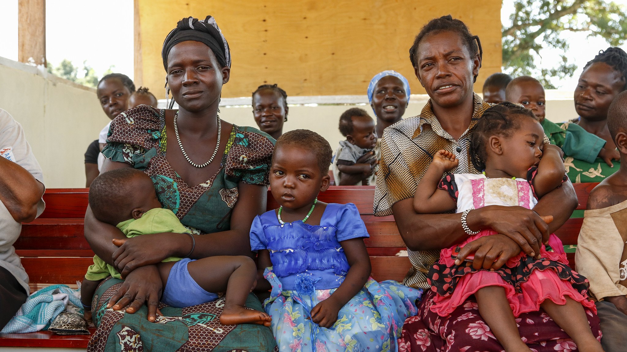Mothers with children wait for care in South Sudan