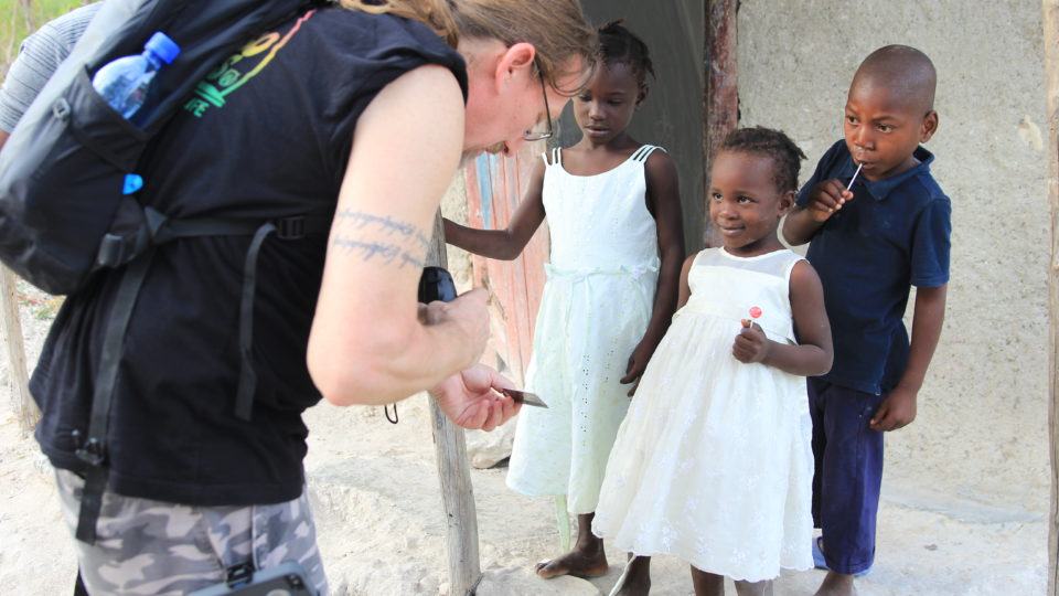 Robert Jay Edwards with kids in Haiti