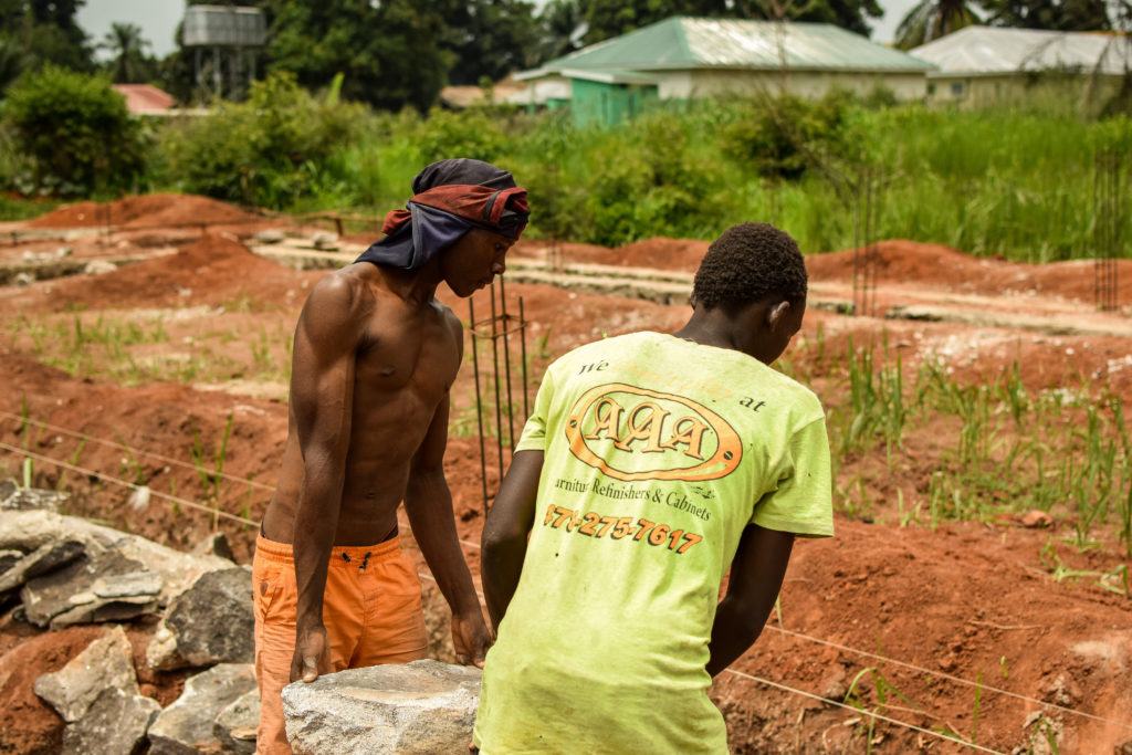 Two Men Working at St. Theresa Hospital in Nzara