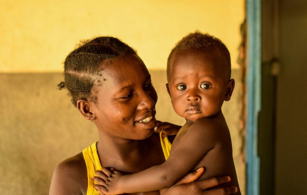 Mother holding her baby