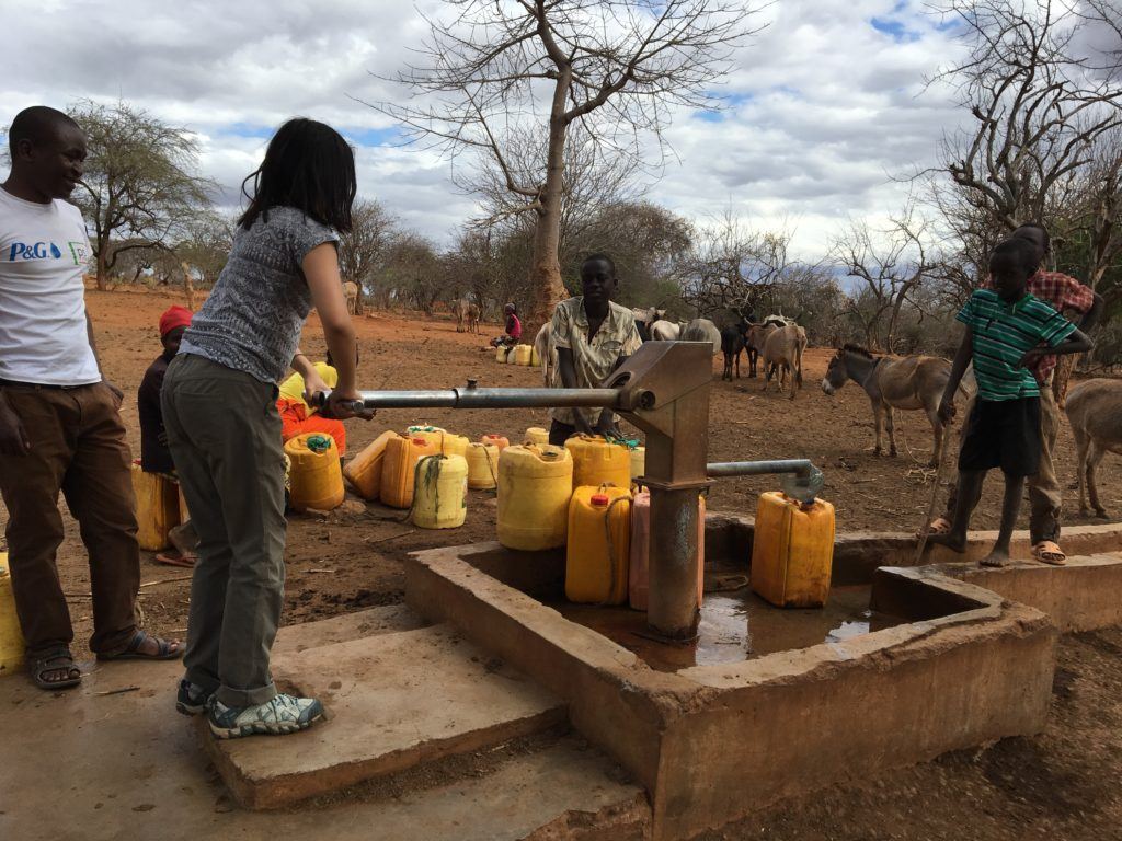 cathryn pumping water from a well in Mutmo