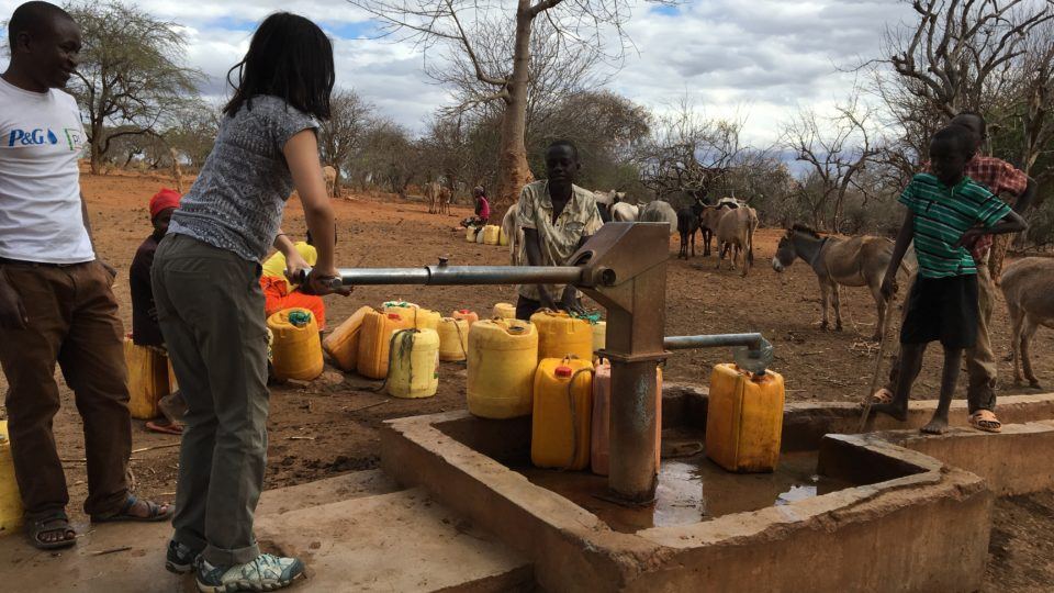 cathryn pumping water from a well in Mutmo