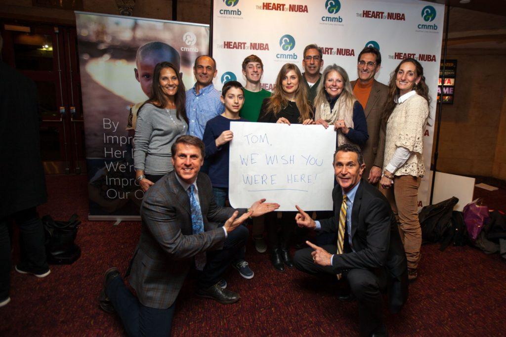 Ken Carlson (bottom left) with many members of Tom Catena’s family, and CMMB President and CEO, Bruce Wilkinson (bottom right) at the premiere of The Heart of Nuba in NYC.