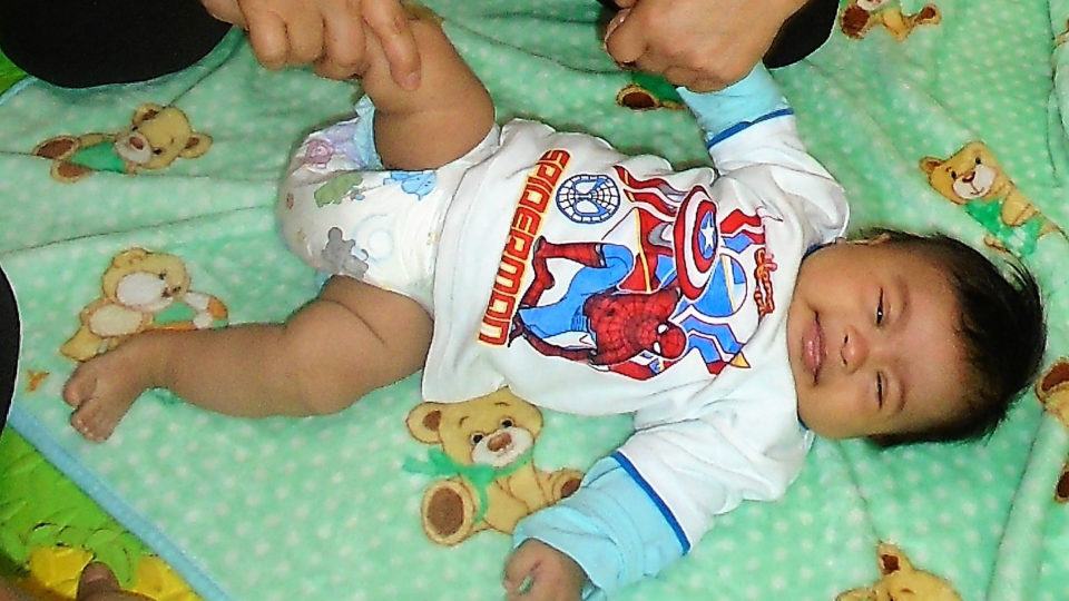 Baby Adrian, smiling big - CMMB Peru Angel Baby Adrian has Down syndrome and needs an angel investor to ensure he can get the therapies he needs.