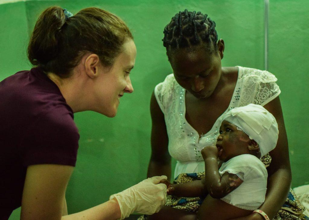 Child burned by cooking oil in South Sudan. It's a common problem. Sarah Rubino takes good care of her.