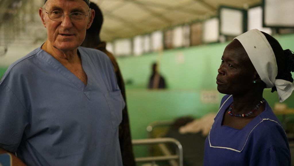 Dr. Jim Peck with one of the nurses at the Nuba Hospital