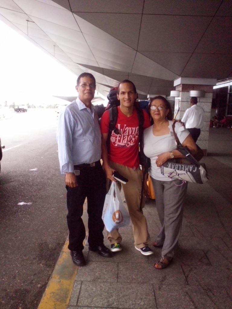 Jose's parents dropping him off at the airport for his trip to Brazil!