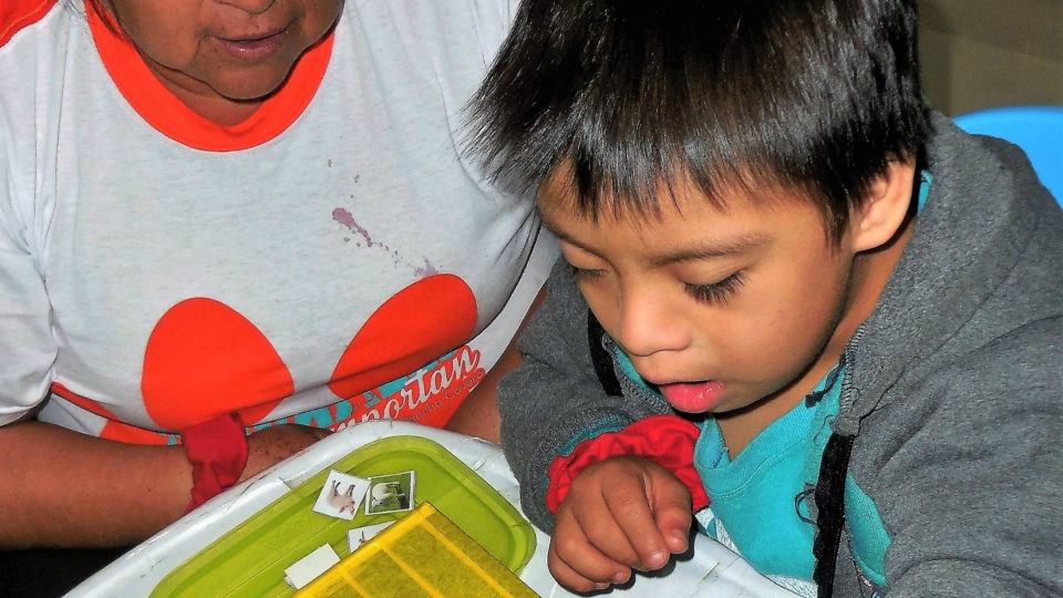 Rodrigo participating in a therapy activity - CMMB Peru Angel Rodrigo participating in a therapy activity - CMMB Peru Angel