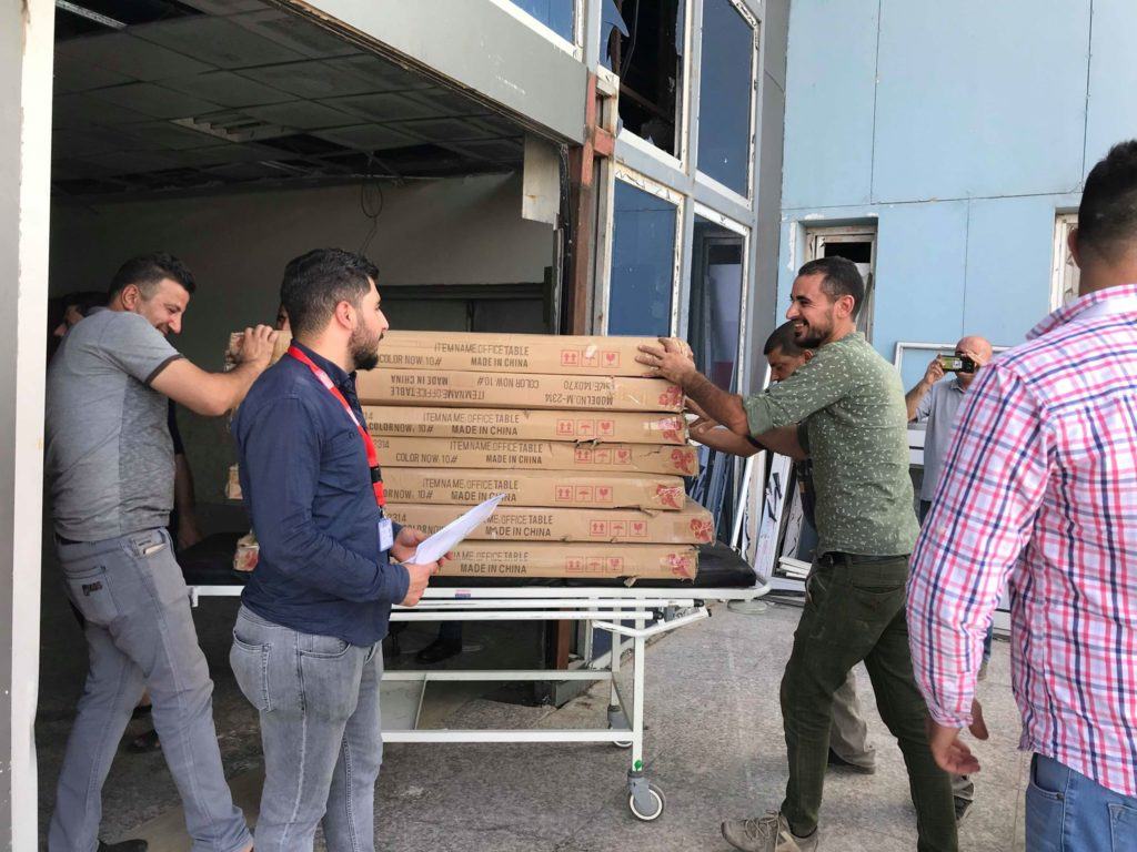 Sama's team delivering equipment to a hospital destroyed in the war