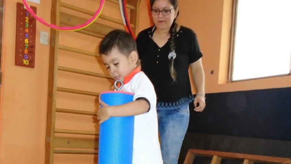Thiago works hard during every therapy session - CMMB Peru Angel