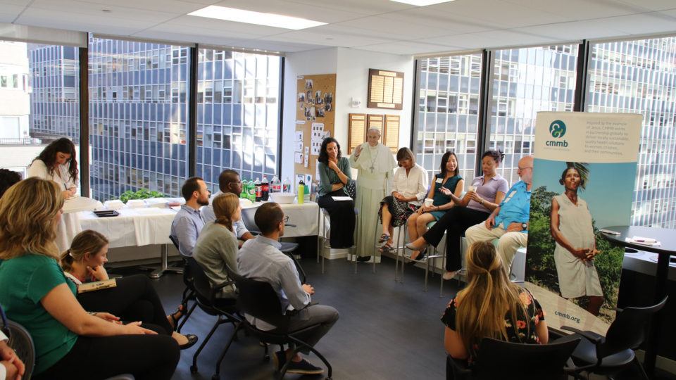 Picture of the volunteer alumni panel and audience at our volunteer orientation in July.