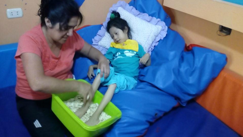 Wilma receiving specialized therapy - CMMB Peru Angel