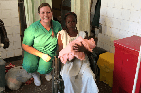 Laura Kyriss with patient at the Mutomo Mission Hospital