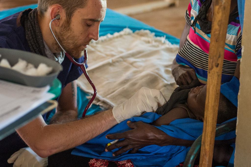 Dr. Matthew Jones is an UK trained doctor serving in South Sudan at St. Theresa Hospital. Here pictured in the children's ward.