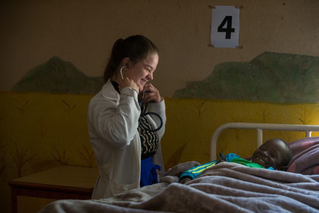 Stephanie smiling with her patient