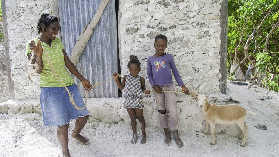 Our angel family with their family goat