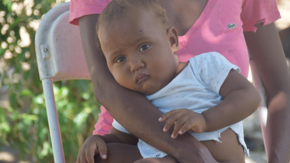 Clarens on his mom's lap