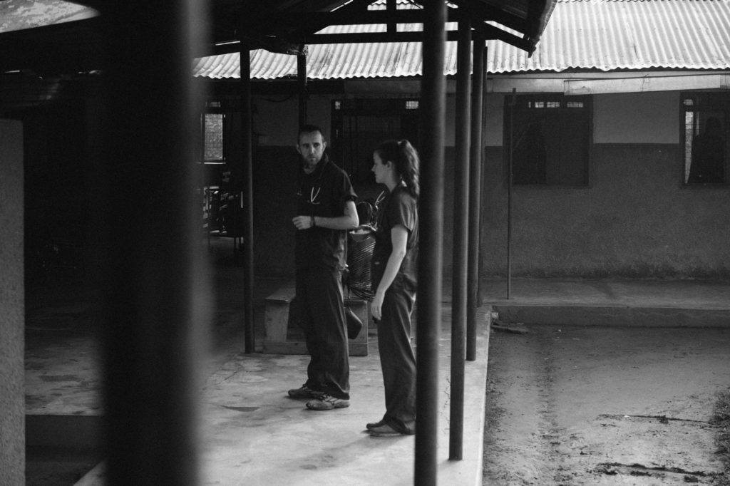 Dr. Matthew stands outside the ward with Sarah Rubino, a nurse and fellow international volunteer