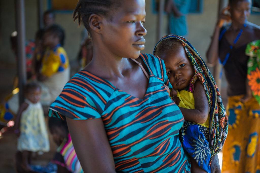 Mothers and babies wait to be seen