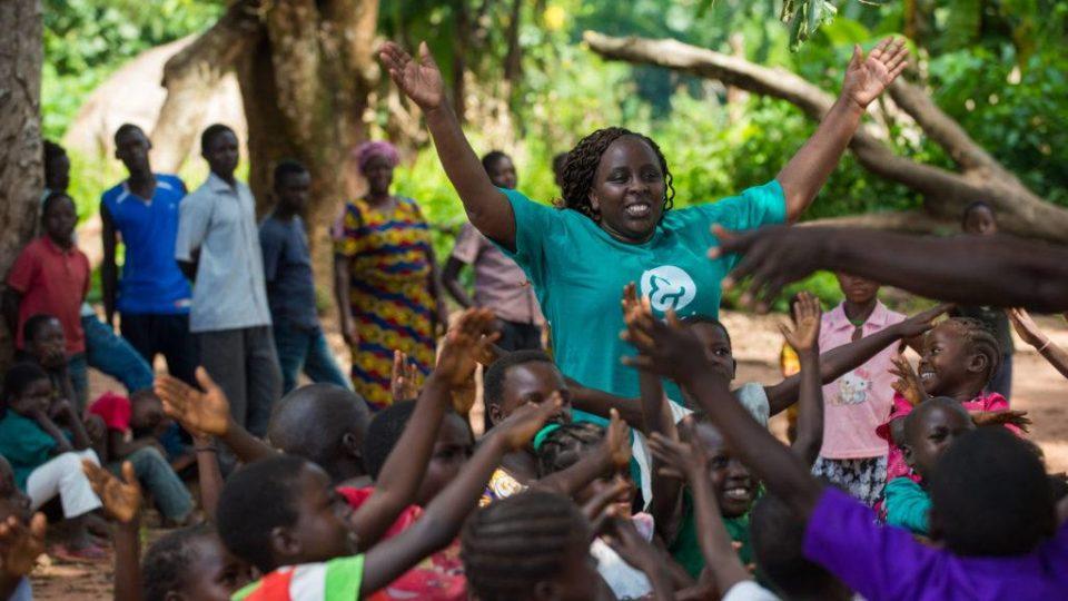 Catherin a CFS aniator leading a CFS activity with former child soldiers and commuity members