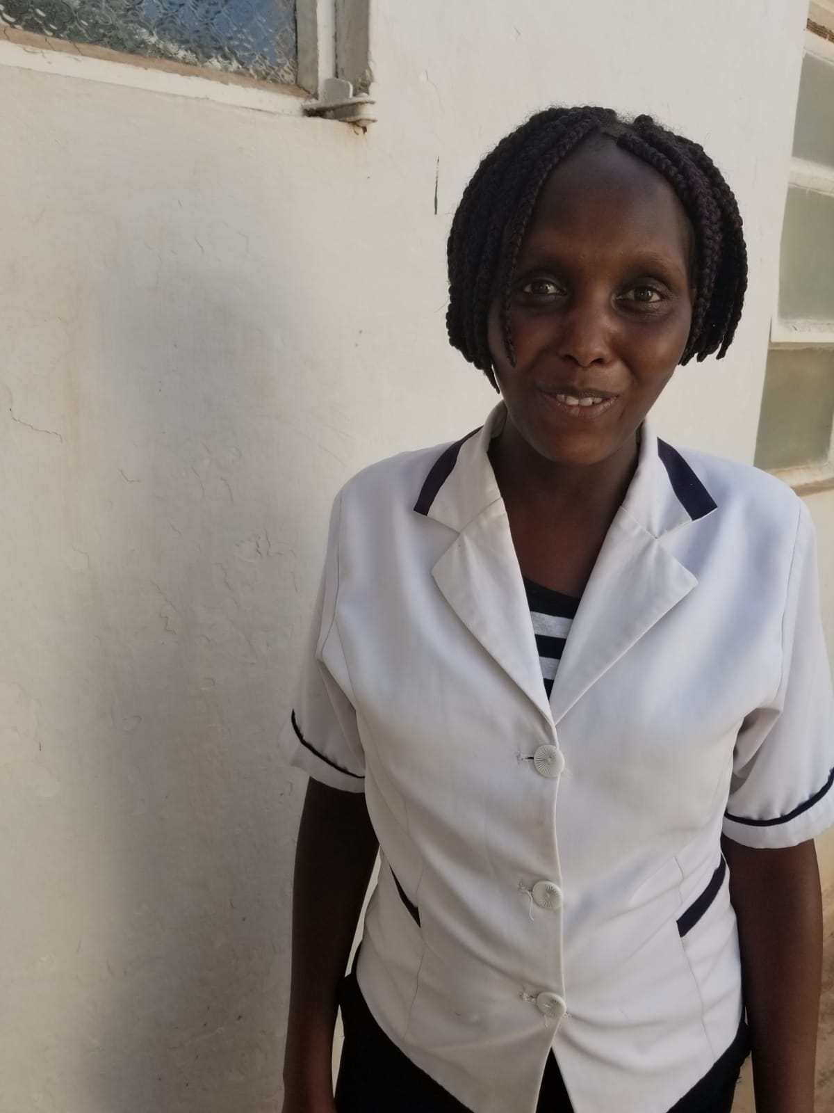 Winnie Kemboi, a nurse at the Mutomo Mission Hospital posing